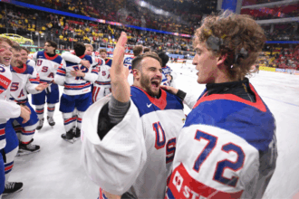 USA Hockey wins gold at the World Championships for the first time since 1933, pounding Switzerland 1-0 in OT
