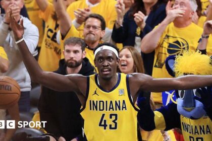 Pascal Siakam in Indiana Pacers kit, with his arms out and a questioning look on his face