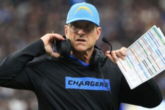 Michigan director Jim Harbaugh has been named in a lawsuit relating to Matt Weiss' hacking case.