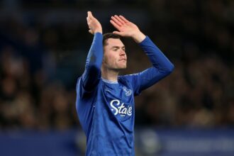 Michael Keane applauds the Everton fans