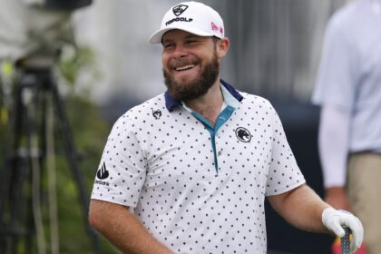 England's Tyrrell Hatton smiles at the third tee at the second round of the 125th US Open, held at Oakmont Country Club on June 13, 2025