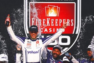 Denny Hamlin wins Michigan State and taunts the crowd while waiting for his third child