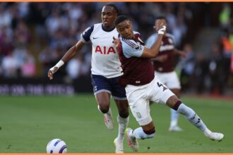 Ezri Konsa in action for Aston Villa against Tottenham