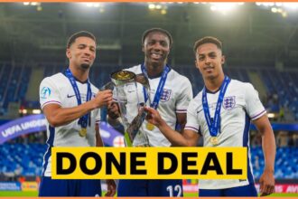 Ethan Nwaneri celebrates with the UEFA European Under-21 Championship trophy