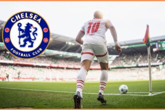 Xavi Simons takes a corner kick for RB Leipzig