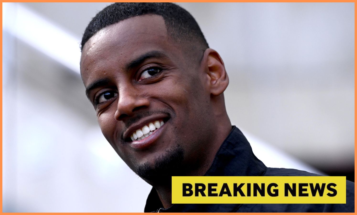Close-up of Alexander Isak smiling, plus yellow