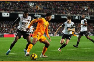 Cristhian Mosquera in action for Valencia against Real Madrid