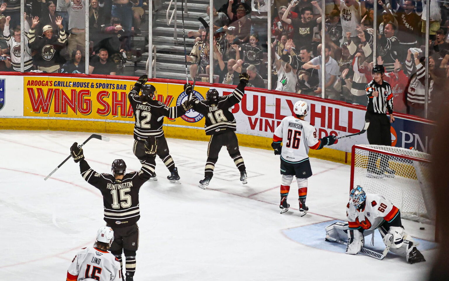 Former Hershey holds the Russian Pierric Duve sign forward