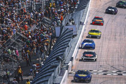 Denny Hamlin survives the late rain, overtime finish and wins again in Dover