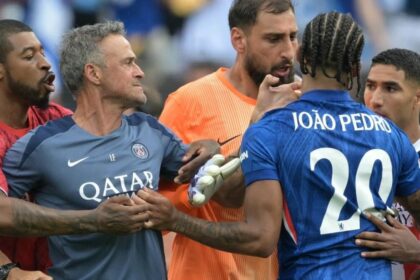 PSG manager Luis Enrique is involved in an argument with Chelsea's João Pedro after the Club World Cup final