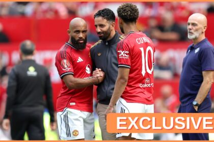 Manchester United head coach Ruben Amorim shakes hands with Bryan Mbeumo.