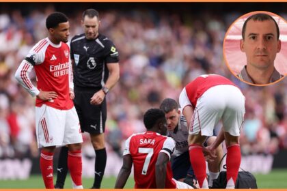 Bukayo Saka receives treatment for an injury