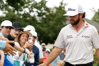 Cameron Young maintains the lead in the Wyndham Championship on the PGA Tour