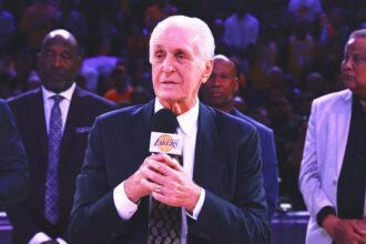 The Lakers announce the statue of former coach Pat Riley before the match against the Celtics