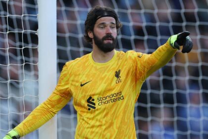 Allison shares injury news with his Liverpool teammate before Atletico Madrid