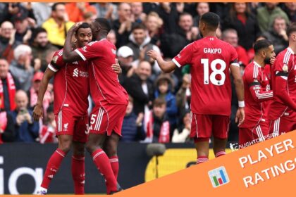 Ryan Gravenberch celebrates with his Liverpool teammates after scoring vs Everton