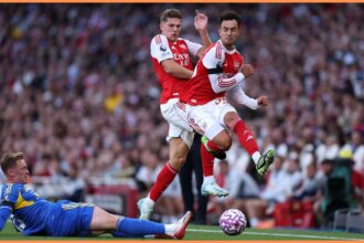 Viktor Gyokeres and Martin Zubimendi of Arsenal