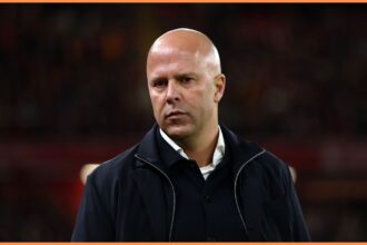 Liverpool manager Arne Slot looks on