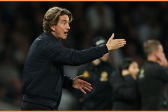 Tottenham manager Thomas Frank gestures during the Wolves game
