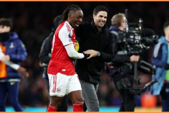 Mikel Arteta celebrates with Eberechi Eze after Arsenal