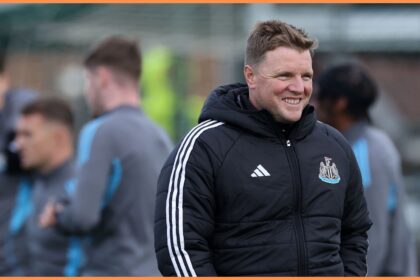 Newcastle United manager Eddie Howe smiles during training