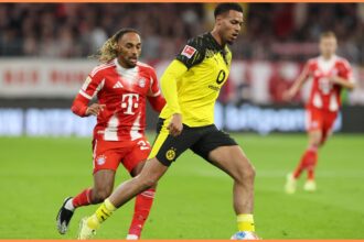 Sacha Boey in action for Bayern Munich vs Borussia Dortmund
