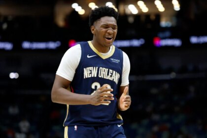 Derrick Queen #22 of the New Orleans Pelicans reacts during the second half of the game against the Denver Nuggets at Smoothie King Center.