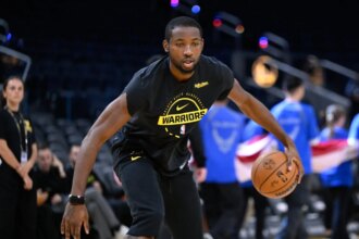 Warriors' Jonathan Kuminga warms up before NBA Game 5 between the Indiana Pacers and Golden State Warriors at Chase Center.