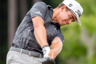 Garrick Higo equals course record and leads Worldwide Technology by one