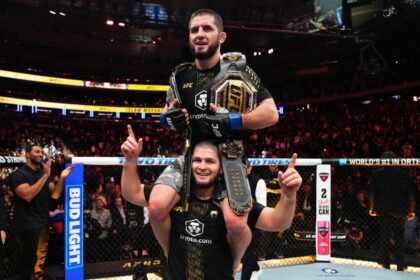 Islam Makhachev rides on Khabib Nurmagomedov's shoulders as he celebrates his victory over Jacques de la Maddalena at UFC 322