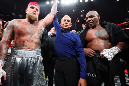 Image of Jake Paul and Mike Tyson after the match