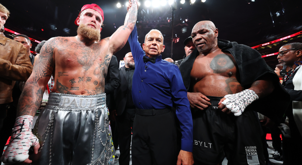 Image of Jake Paul and Mike Tyson after the match