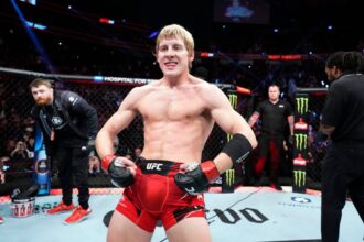 Paddy Pimblett celebrates defeating Jared Gordon at UFC 282.