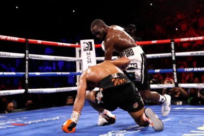 Terrence Crawford knocks down Shawn Porter in title match