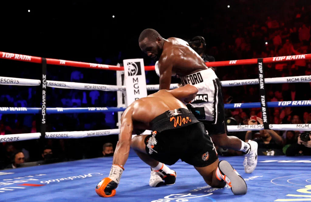 Terrence Crawford knocks down Shawn Porter in title match