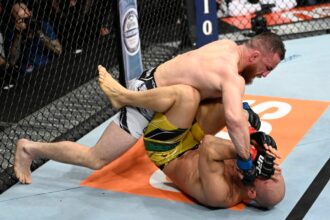 Merab Dvalishvili punches Marlon Moraes during their fight at UFC 266 in Las Vegas