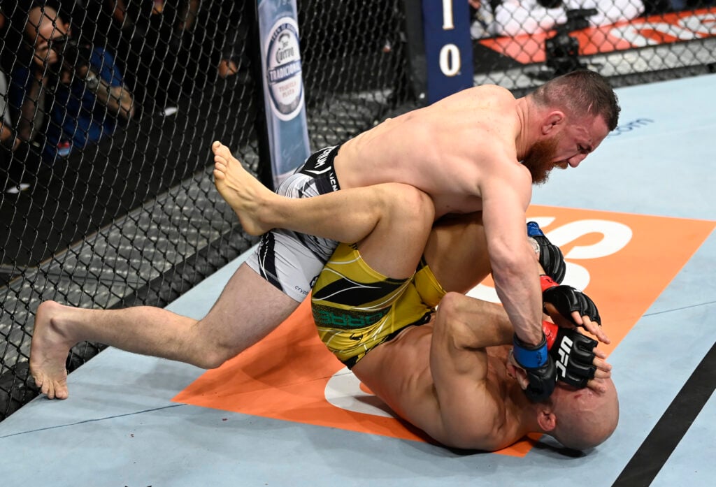 Merab Dvalishvili punches Marlon Moraes during their fight at UFC 266 in Las Vegas