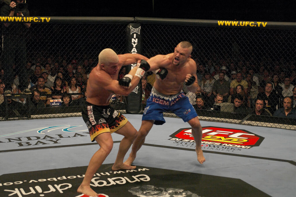 Chuck Liddell punches Tito Ortiz at UFC 47