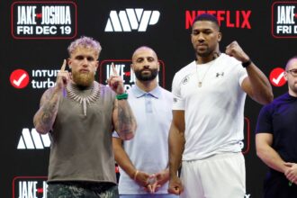 Jake Paul, Nakisa Bidalian and Anthony Joshua (left) take the stage and pose for photos at the press conference.
