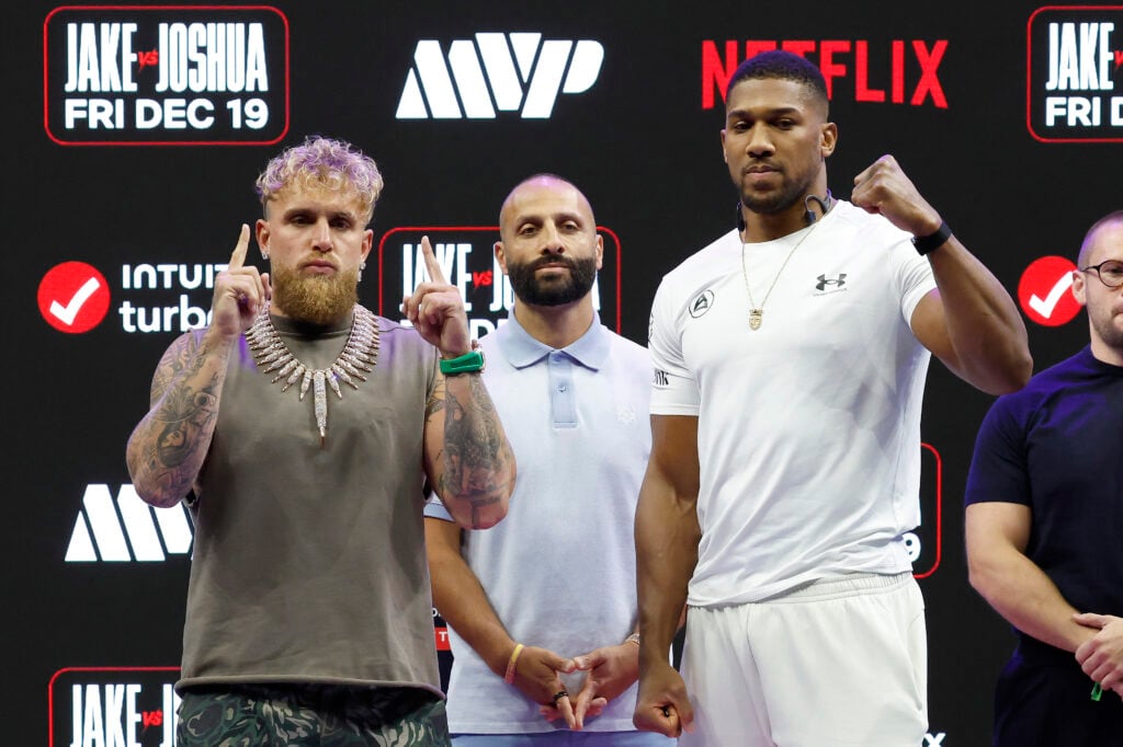 Jake Paul, Nakisa Bidalian and Anthony Joshua (left) take the stage and pose for photos at the press conference.