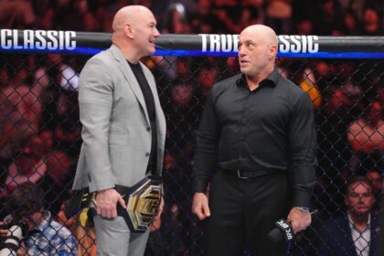 Joe Rogan and Dana White speak in the Octagon after knockout of Ilia Topuria at UFC 317