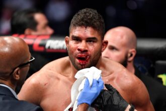 Alistair Overeem receives treatment after sustaining severe cut during match against Jairzinho Rozenstryk