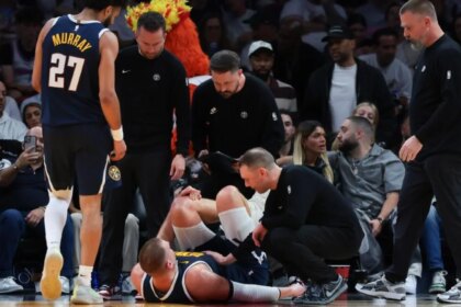 Nikola Jokic injured: Nuggets star out of game with left knee injury