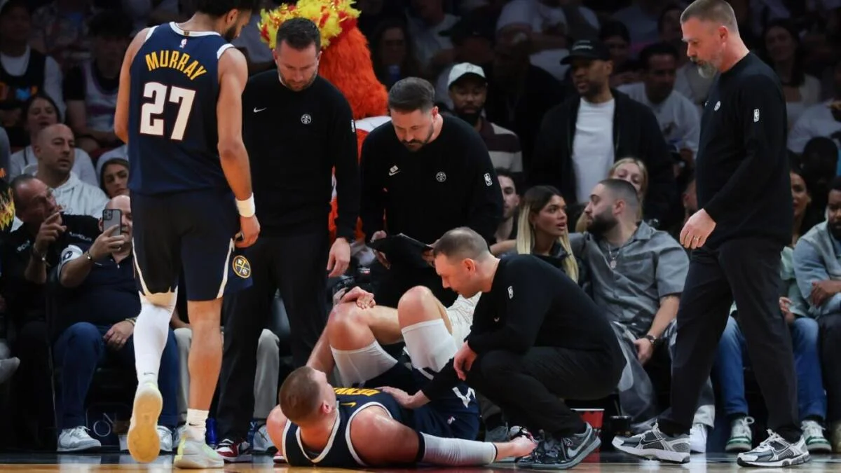 Nikola Jokic injured: Nuggets star out of game with left knee injury