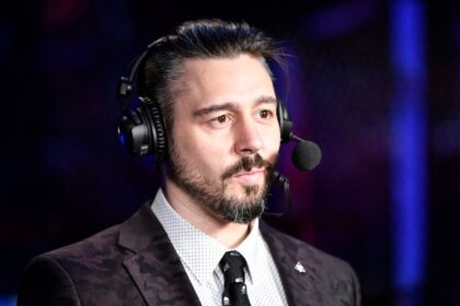 Dan Hardy looks on while commentating at the UFC Fight Night event in Abu Dhabi