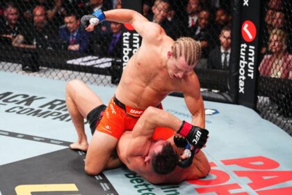 Paddy Pimblett punches Michael Chandler at UFC 314