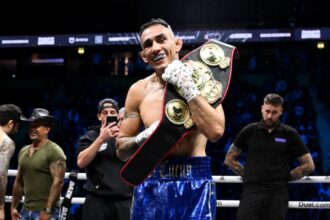 Tony Ferguson celebrates Misfits 22 victory with belt