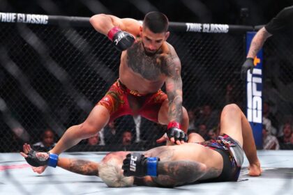 Ilya Topria lands a KO punch against Charles Oliveira in the UFC