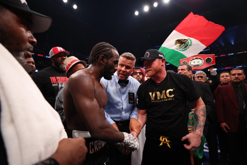 Terrence Crawford and Canelo Alvarez hugging after the fight