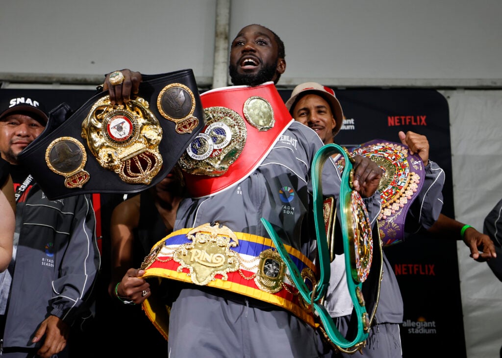 Terrence Crawford poses with his undisputed super middleweight title